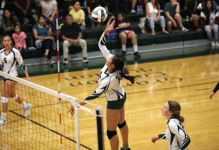  Flagstaff’s Gracelyn Nez attacks the Marcos de Niza defense Tuesday night during a home match 