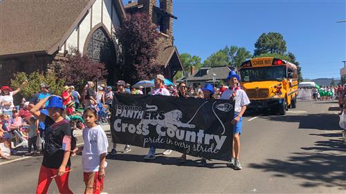 Coconino Panthers cross country walk with FUSD in the 4th of July Parade 