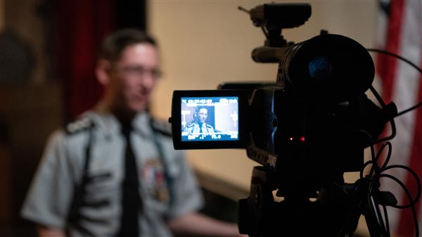Student being interviewed on camera. Student being interviewed on camera.
